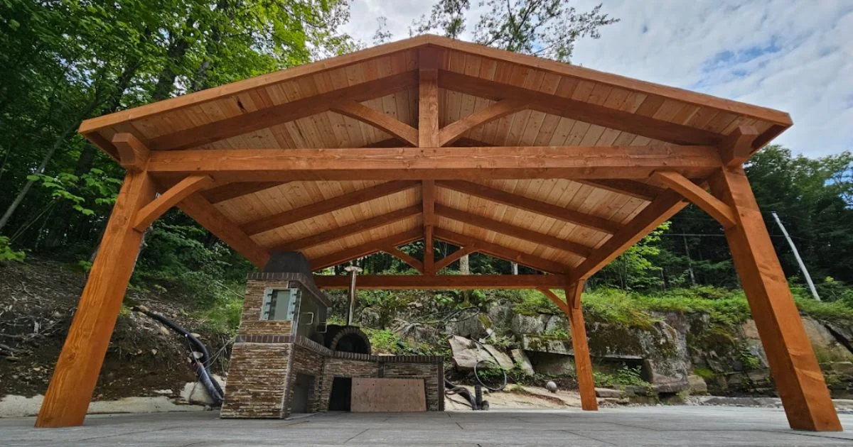Large timber pavilion with a natural wood finish